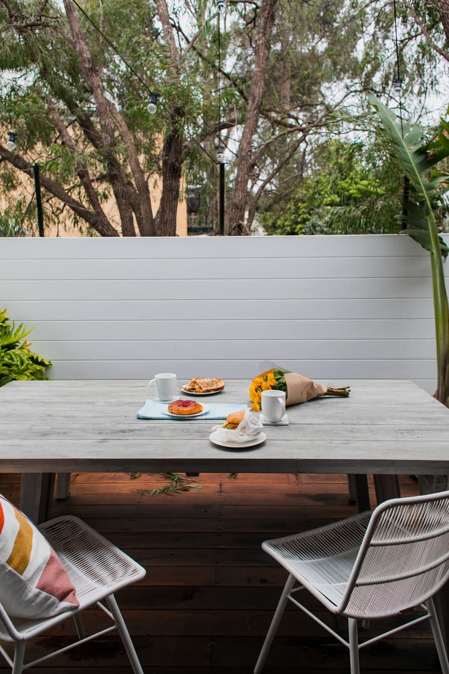 Breakfast on the terrace: toast, fruit and coffee