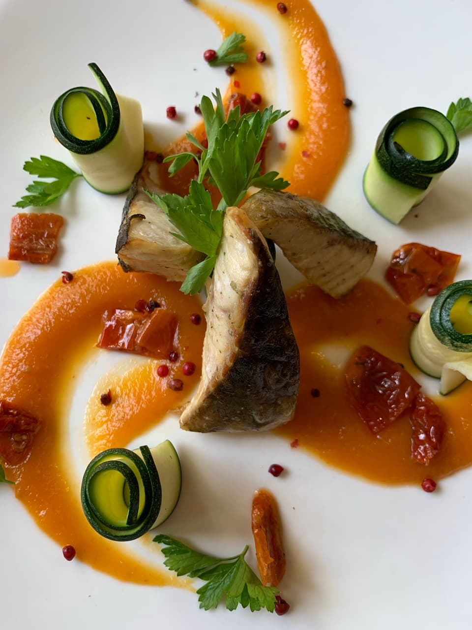 Market fish with carrot purée and courgette